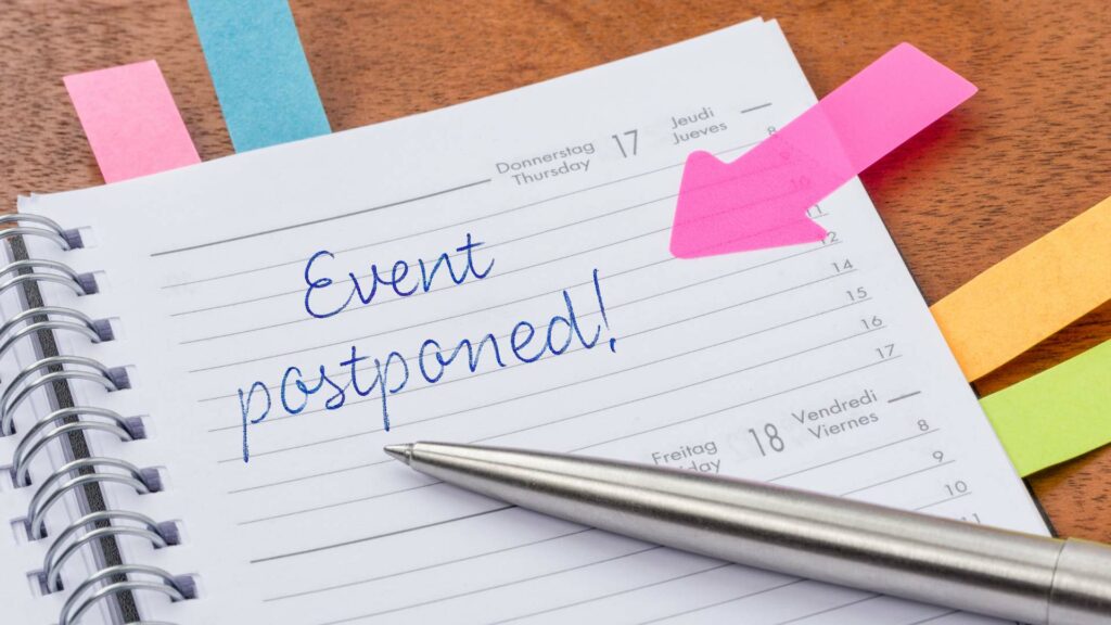 event postponed in a notebook